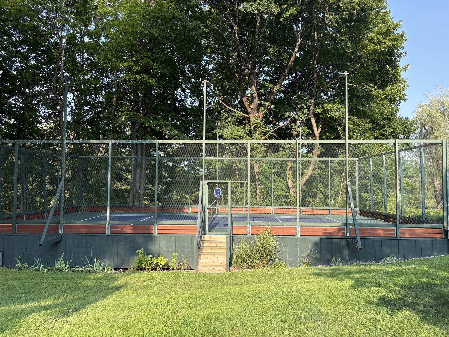 The platform tennis court from the lawn